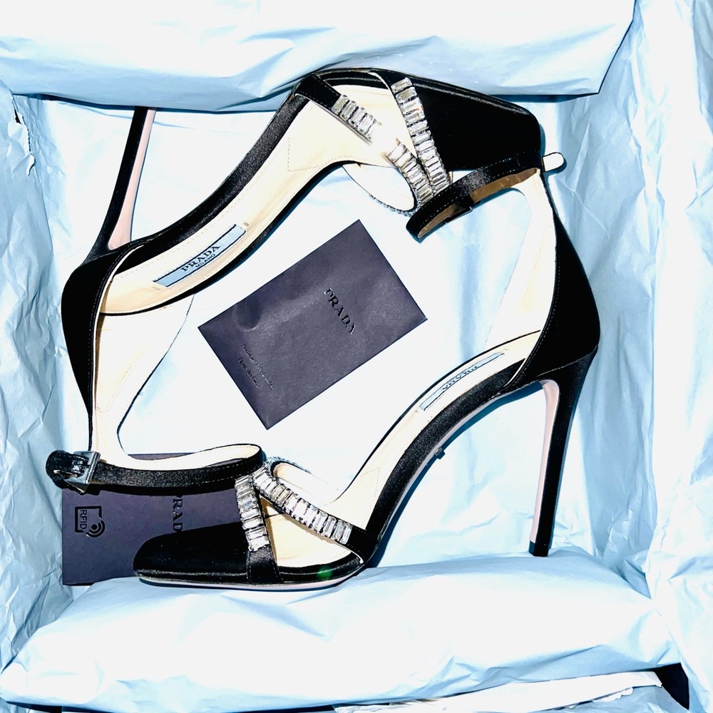 Black Prada open toe heels.